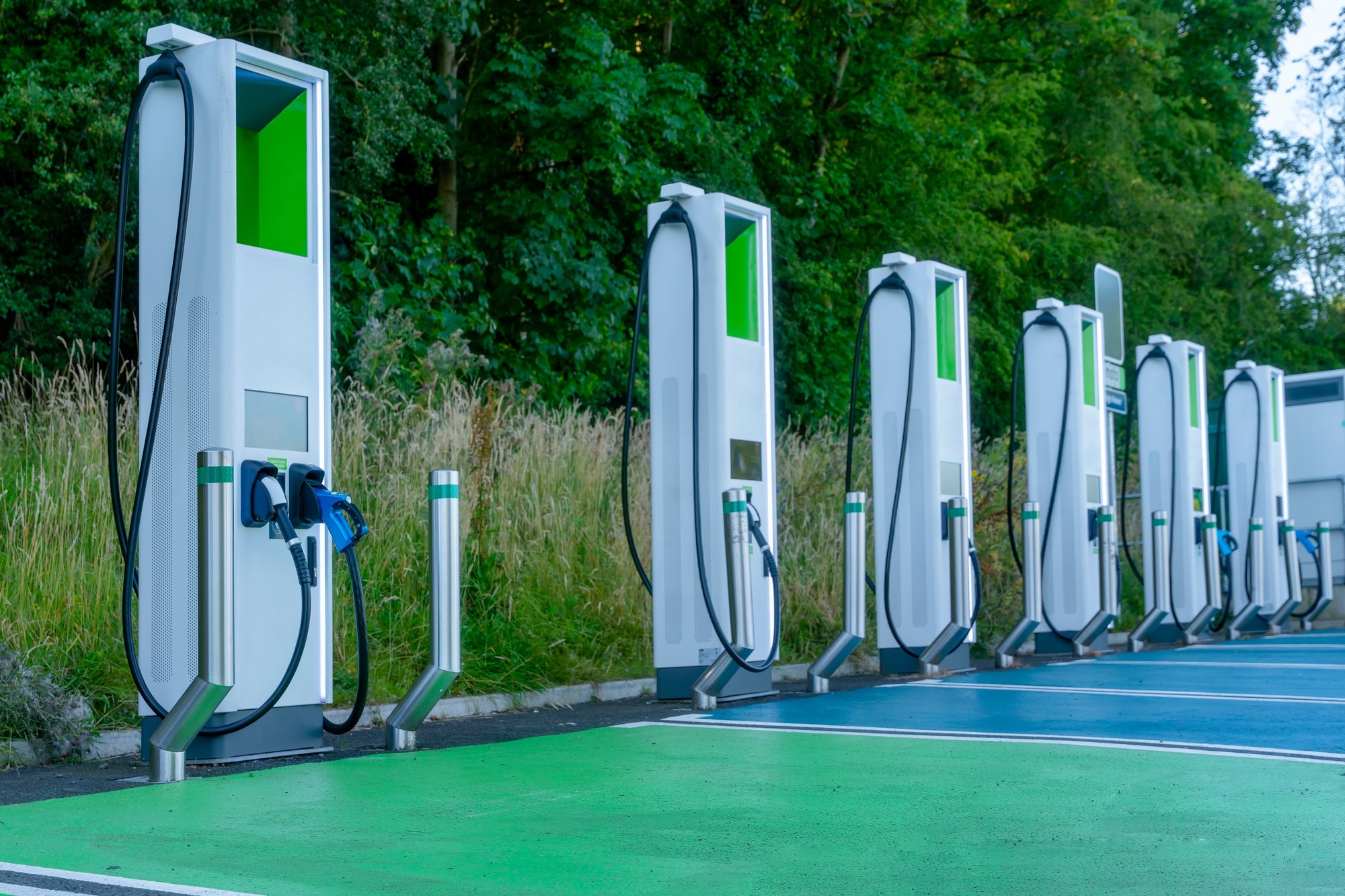 row of electric vehicle charging stations